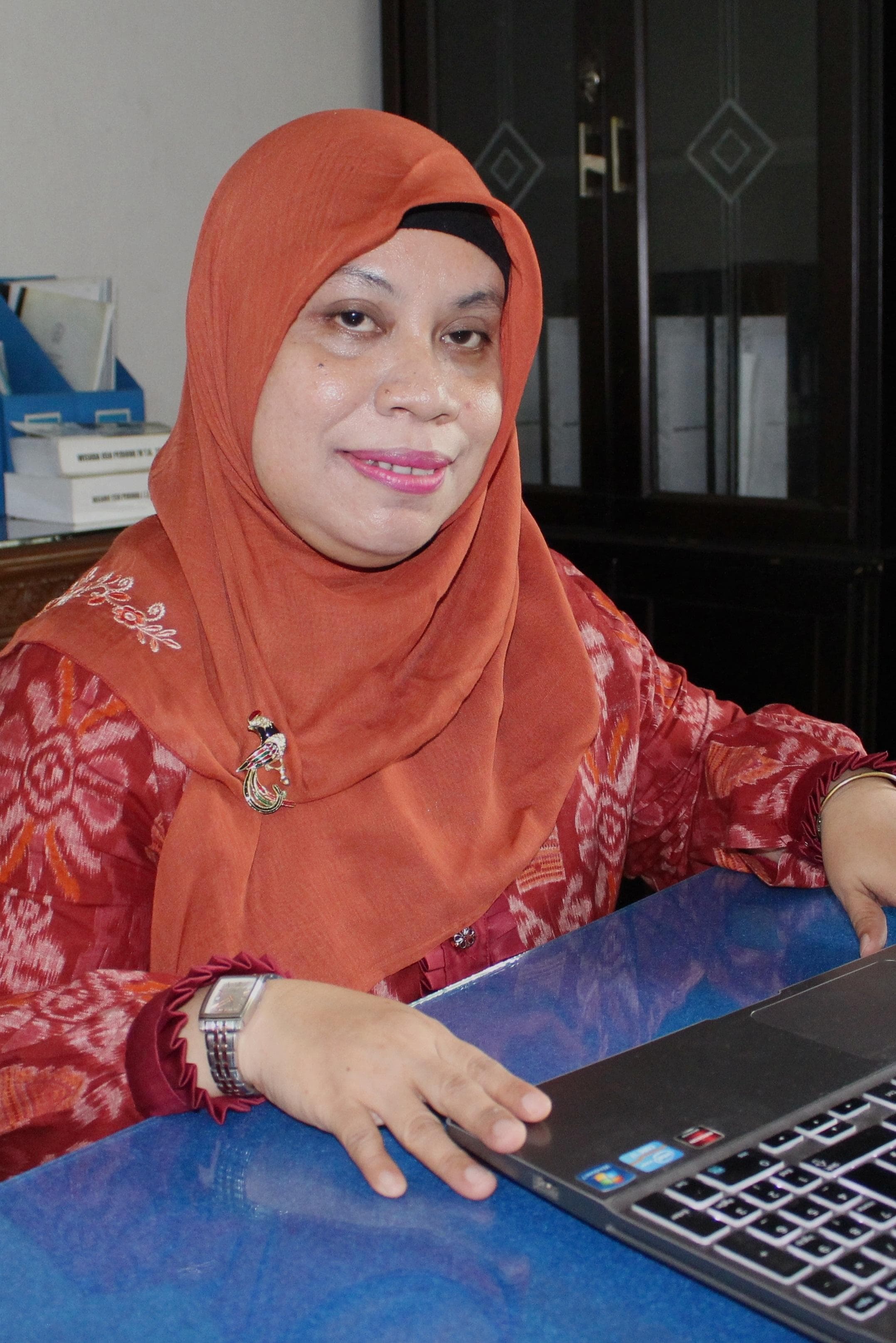 Dr. Erni Jumilawaty M.Si.